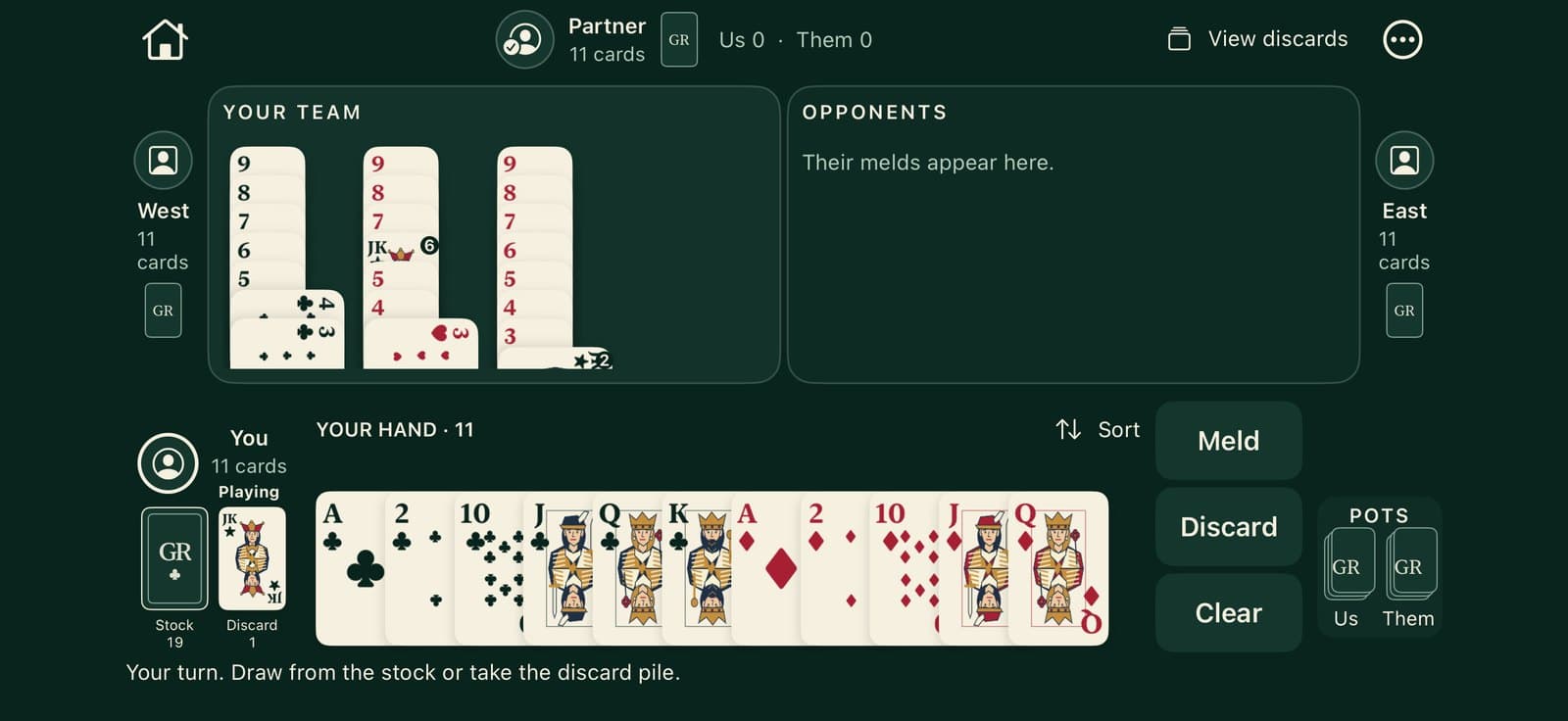 American Burraco on iPhone: the table in landscape, with three seven-card runs on your team's side and your hand of eleven cards.