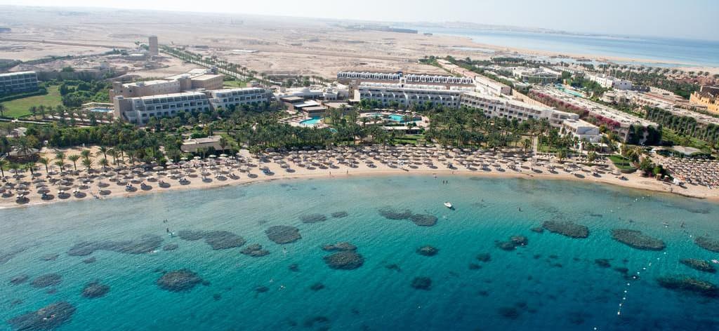 Aerial view of a beach and coral reefs in Makadi Bay