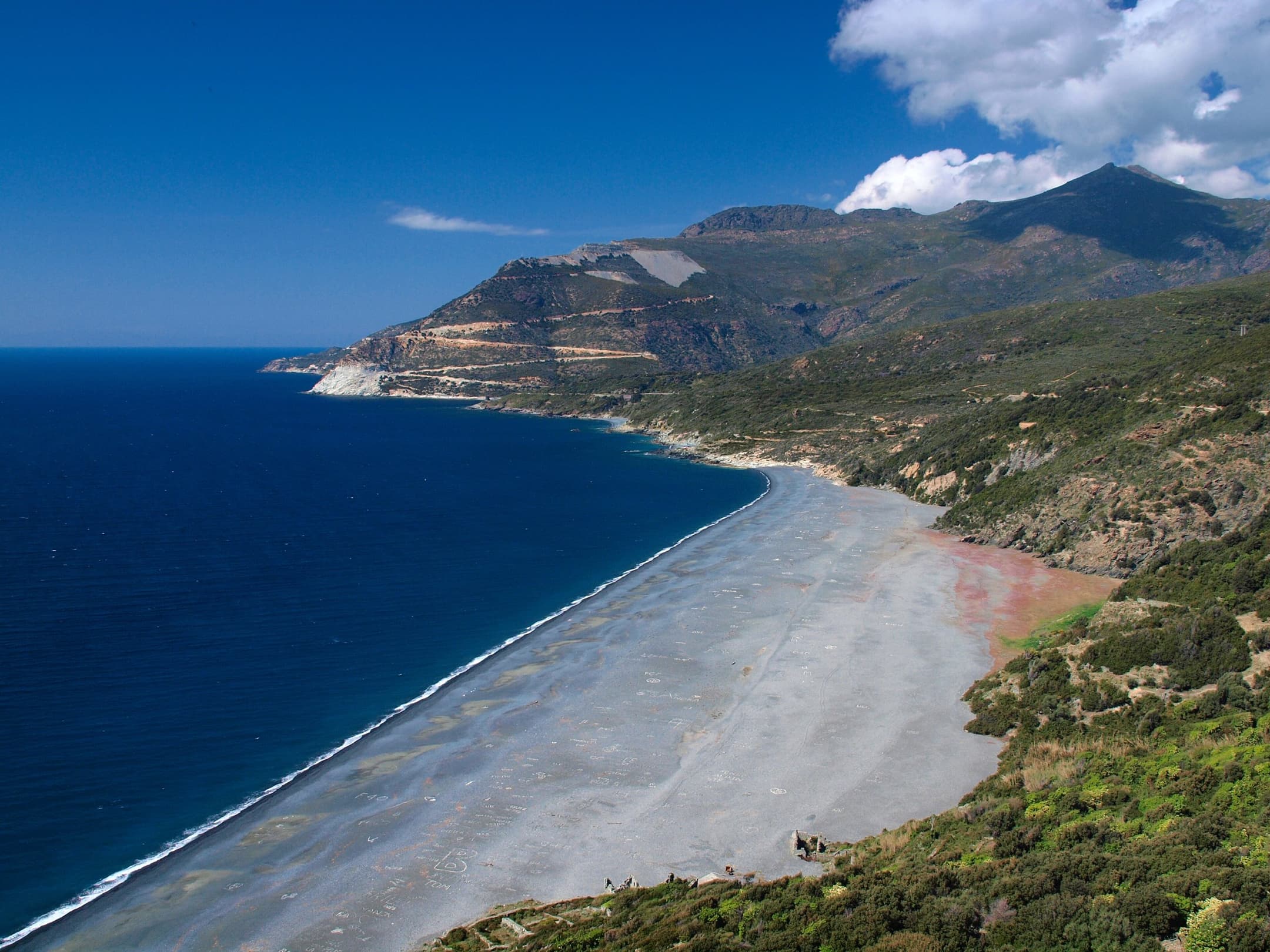 The long black beach below the village of Nonza